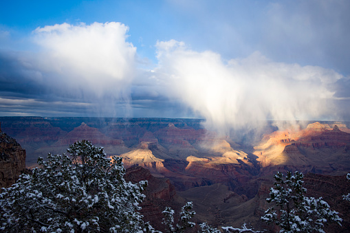 A fresh dusting of snow coats the upper levels of the South Rim.