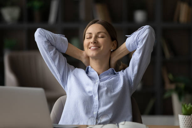 istock Relaxed pleasant happy young woman enjoying break time. 1329690287