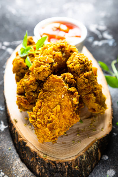 istock Crispy fried chicken wings with sauce 1329691413