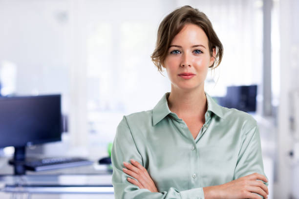 istock Confident businesswoman standing at the office 1329692963