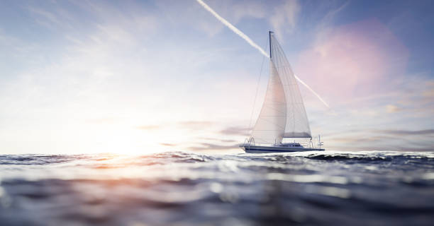 sailing yacht on the ocean - sailing imagens e fotografias de stock