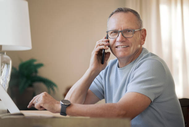 istock Shot of a mature man using his smartphone to make a call 1329693492