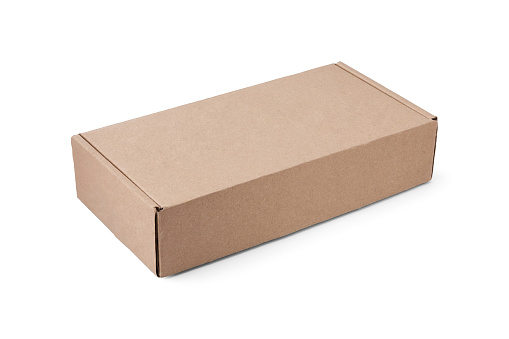 Rectangular flat cardboard box for packing parcels or gifts lies horizontally at an angle, isolated on white.