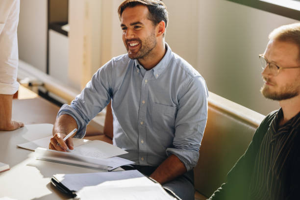 istock Young man at startup meeting 1329696044