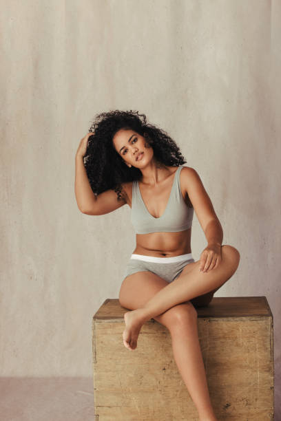 istock African American model posing confidently in her natural body 1329697098