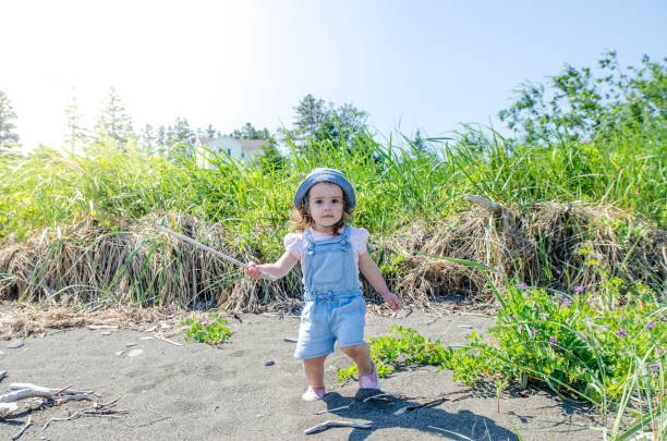 istock Little girl on beach 1329698527