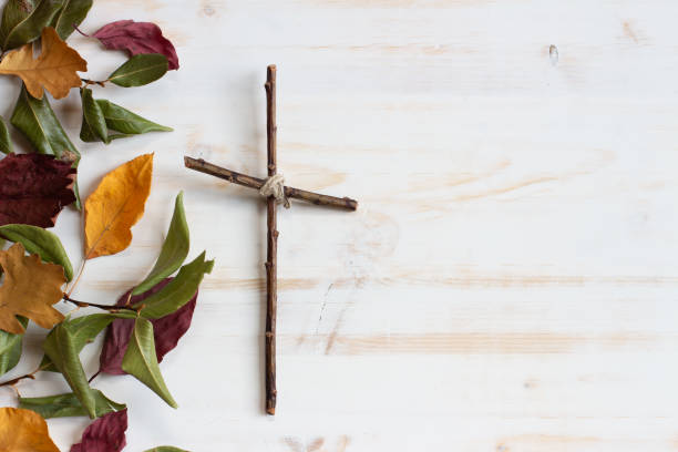 istock Wood cross with Autumn leaf border 1329701824