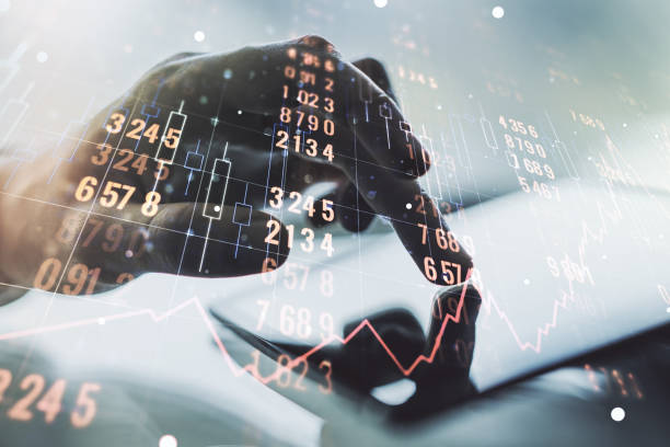 istock Multi exposure of abstract graphic data spreadsheet sketch and hand working with a digital tablet on background, analytics and analysis concept 1329703806
