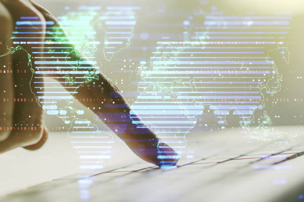 istock Multi exposure of abstract creative digital world map and hand typing on computer keyboard on background, research and analytics concept 1329703882