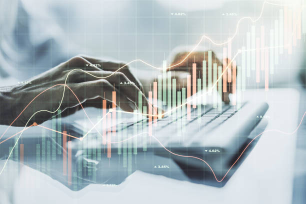 istock Multi exposure of abstract financial diagram with hand typing on computer keyboard on background, banking and accounting concept 1329703941