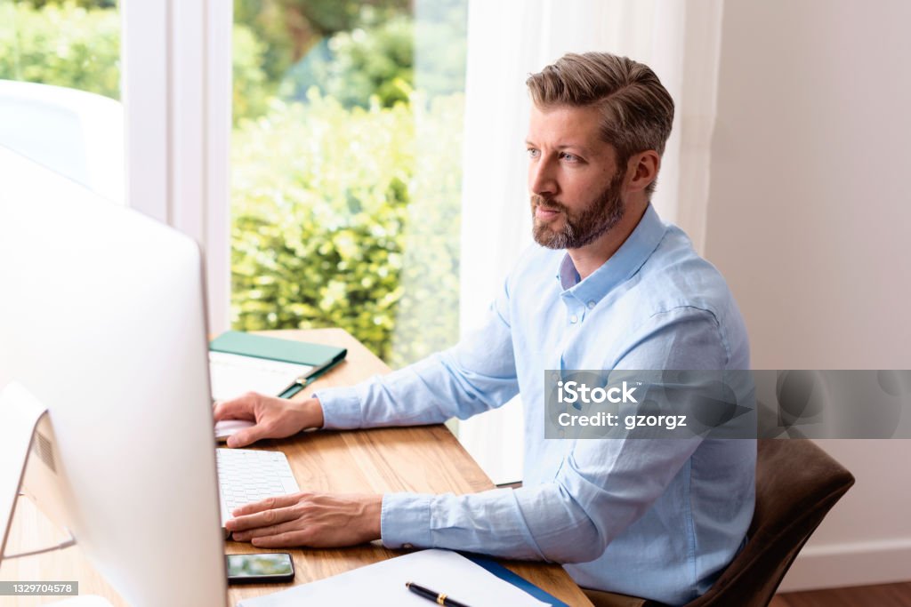 Office Man While Using Computer Businessman Using Computer While Working From Home Stock Photo ...