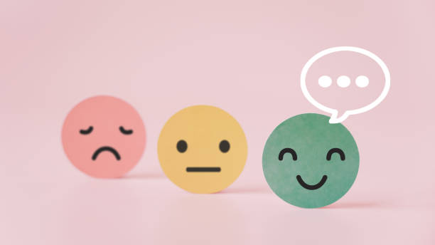 istock outstanding smiling face on green paper with speech bubble on pink background, satisfaction survey ,good feedback rating and positive customer review, mental health assessment, leadership 1329705946