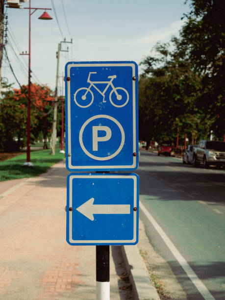 istock bicycle parking sign on the road 1329711979