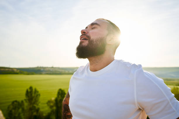 istock Young bearded man portrait outdoors in the mountains 1329717631