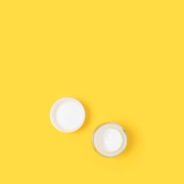 istock Face cream on a yellow background. 1329720770