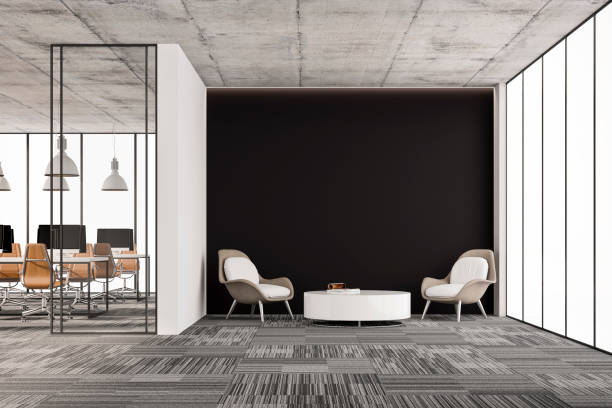istock Large office interior: a reception desk, a lounge corner with copy space and wordesks behind glass door 1329722364