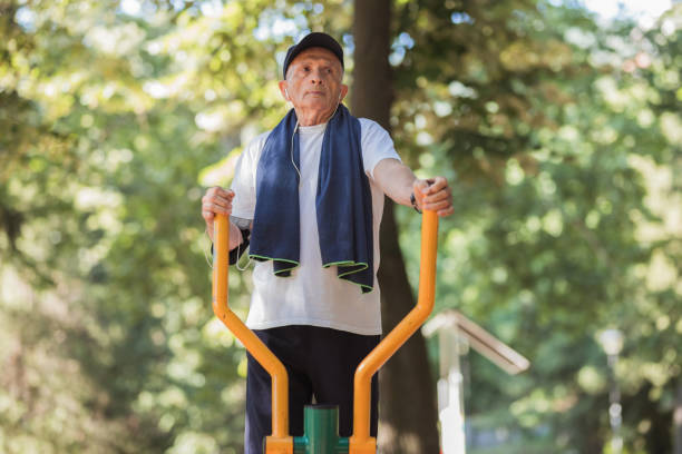 istock Senior man doing cardio exercise at outdoor gym 1329729430