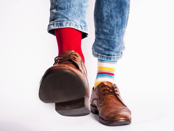 istock Men's legs, trendy shoes and bright socks 1329732483