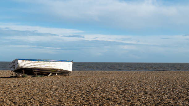 Colorful fishing boat on the beach at Aldeburgh, Suffolk, UK