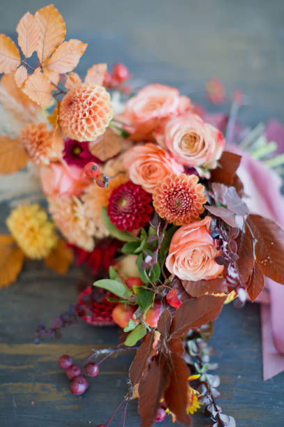 istock Autumn bouquet with orange red flowers 1329736114