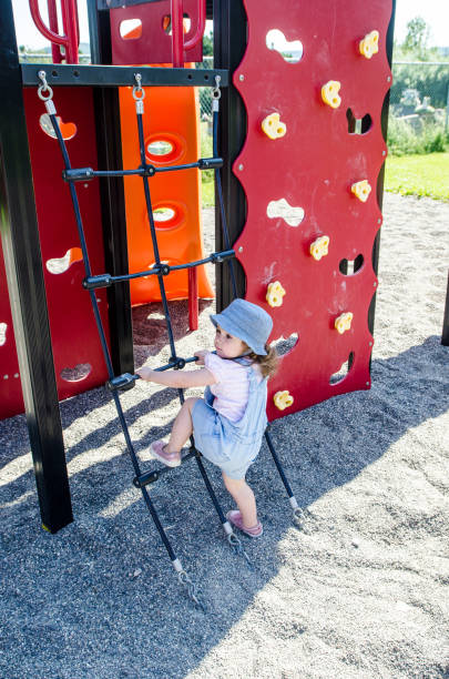 istock Little girl in playground 1329745184