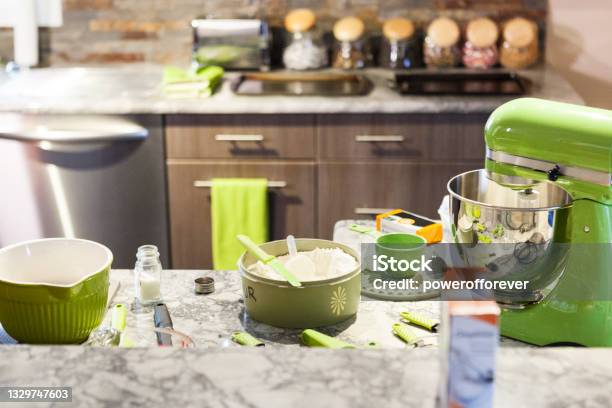 Kitchen Counter Full Of Objects While Baking Chocolate Chip Cookies Stock Photo - Download Image Now