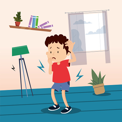 The little boy inside the house is afraid of the earthquake. Bookcase, flowerpot and  lamp are moving due to earthquake. There is a plant on the ground, the plant is on its side, about to fall. The boy is holding his head with his hands in fear. Vector of boy with sad and worried facial expression. There is a house concept in the background.