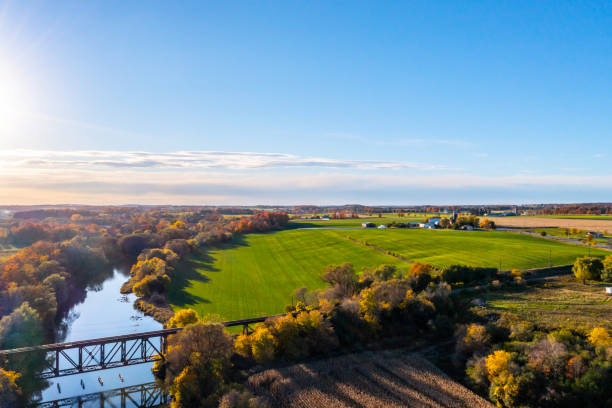istock Aerial Railway Bridge and Conestogo River at dusk, St. Jacobs, Canada 1329750838