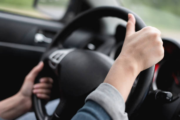 istock Woman is driving 1329754544