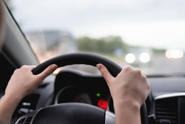 istock Woman is driving 1329754549