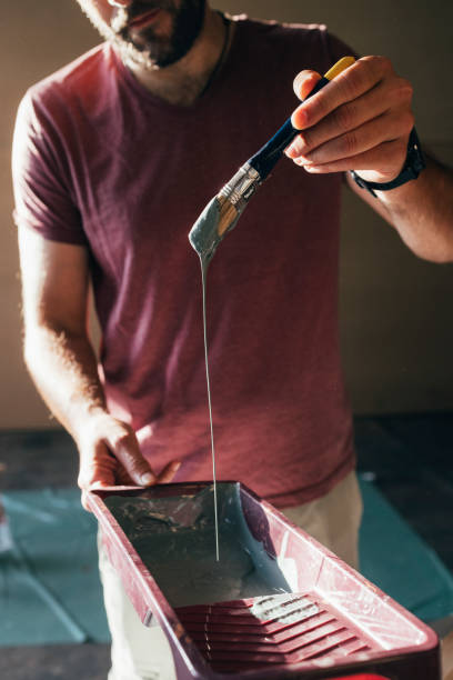 istock Anonymous Man About to Start Painting 1329755873