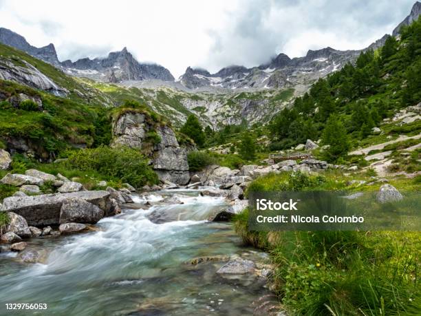 Alpine Valley In Val Masino Stock Photo - Download Image Now - Sondrio, Beauty, Blue