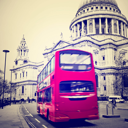 St. Paul's Cathedral with red bus in London with Instagram effect filter