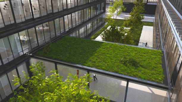 Green building A sustainable green office building with a green roof green building photos stock pictures, royalty-free photos & images