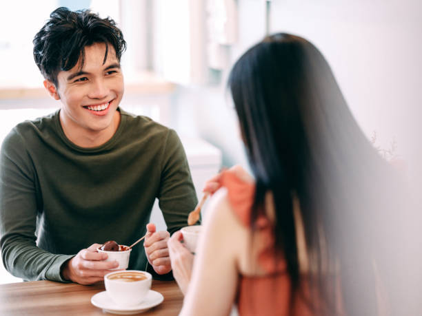 istock couple in cafe 1329757982