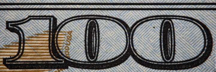 One hundred American dollars close-up, details of a genuine American 100 banknote