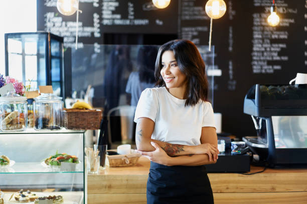istock Portrait of happy cafe owner 1329759097