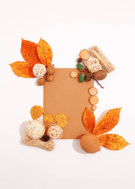 istock Fall Winter cozy flat lay mock-up with autumn leaf brunch decor.  Minimal seasonal aesthetic wallpaper 1329761073