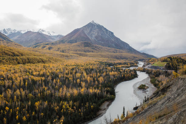 istock Alaskan mountain range and Matanuska River in fall colors 1329762844