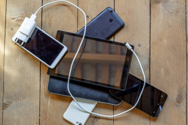 istock Group electronic devices and office equipment. Smartphones, tablet, eBook, battery charger 1329766087