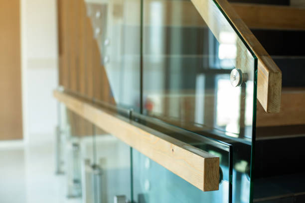 istock Selective focus to wooden railings mounted to glass 1329773002