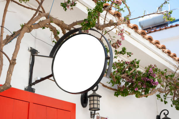 istock Cycle white light box sign mockup and clipping path on vintage house wall 1329773182