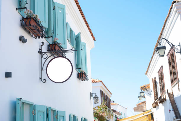istock Cycle white light box sign mockup and clipping path on vintage house wall 1329773694