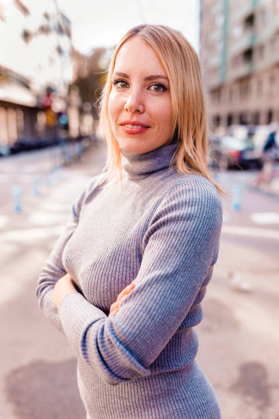 istock Blond woman on the street 1329777953