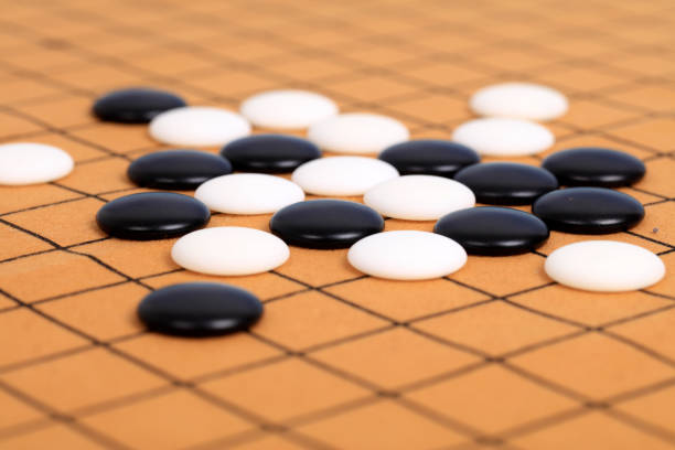 istock chinese game go,  Gobang and go game board 1329777993