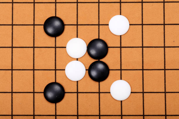 istock chinese game go,  Gobang and go game board 1329778008