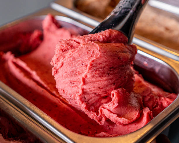 istock Delicious strawberry gelato on a base. 1329779418