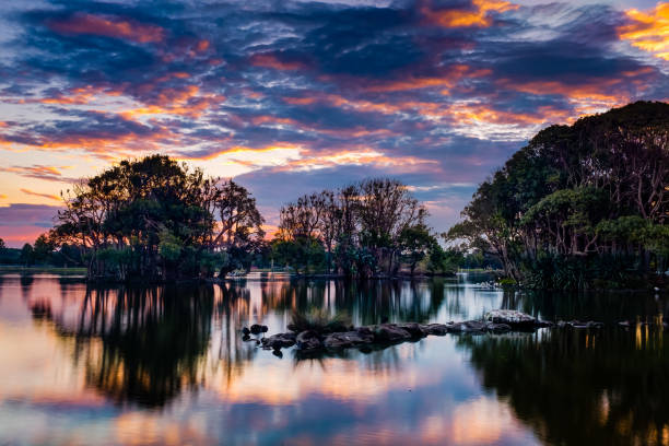 istock Beautiful Sunset Scape in Centennial Park with Ducks and Swans 1329784320