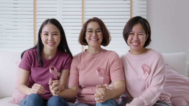 Portrait group asian pink woman happy breast cancer awareness campaign