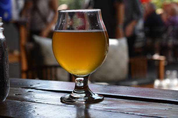 istock Bar table with glasses goblets of beer. 1329796079